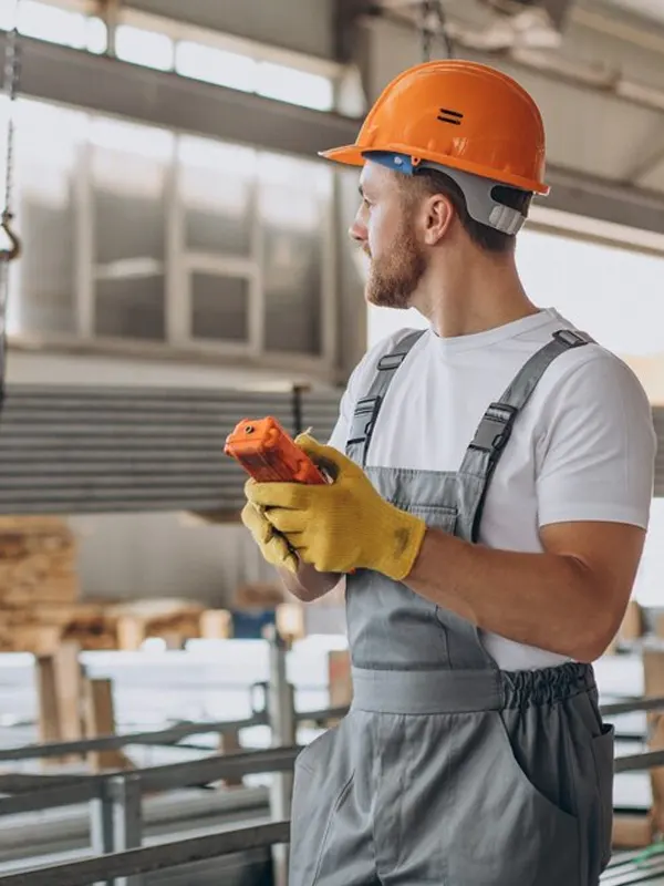 A commercial maintenance service man doing a commercial repair in a Jersey building.