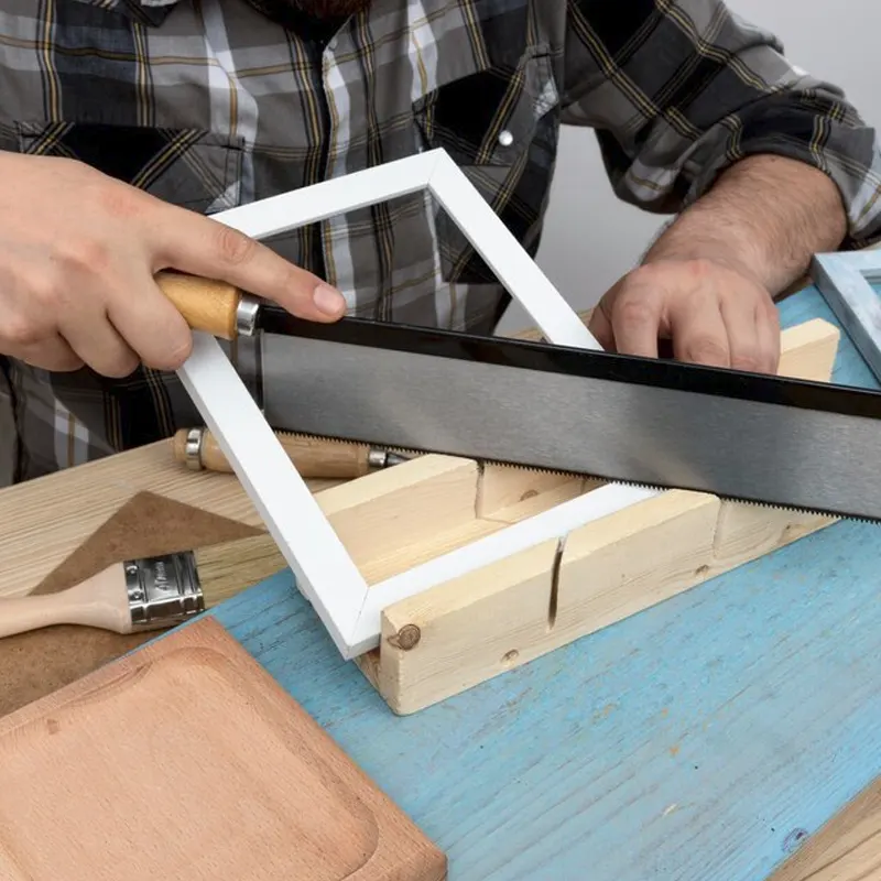 A local window carpenter near me building a window frame for a home in Jersey.
