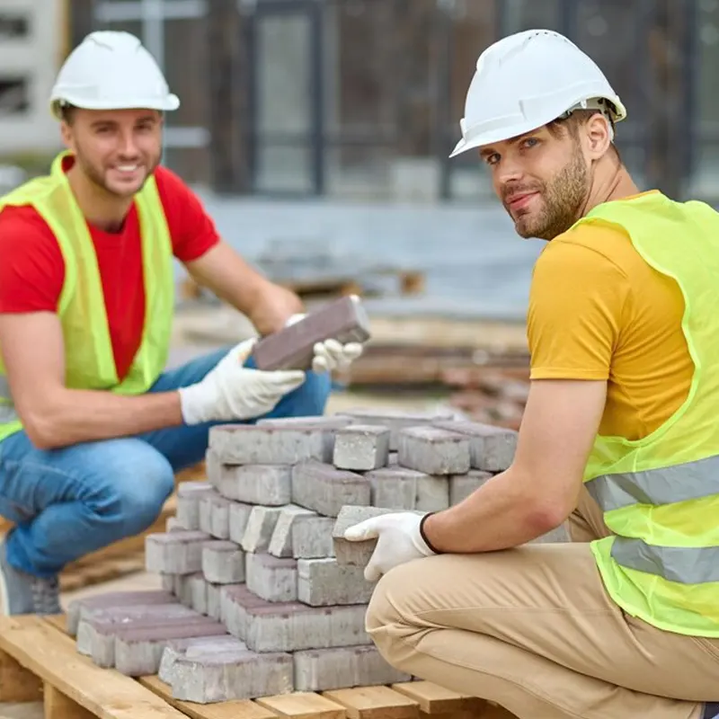 Expert builders in Jersey doing construction work in a commercial building.