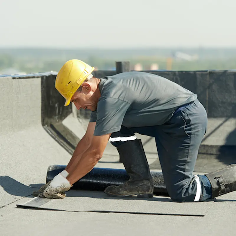 An emergency flat roofing service in a Jersey building.
