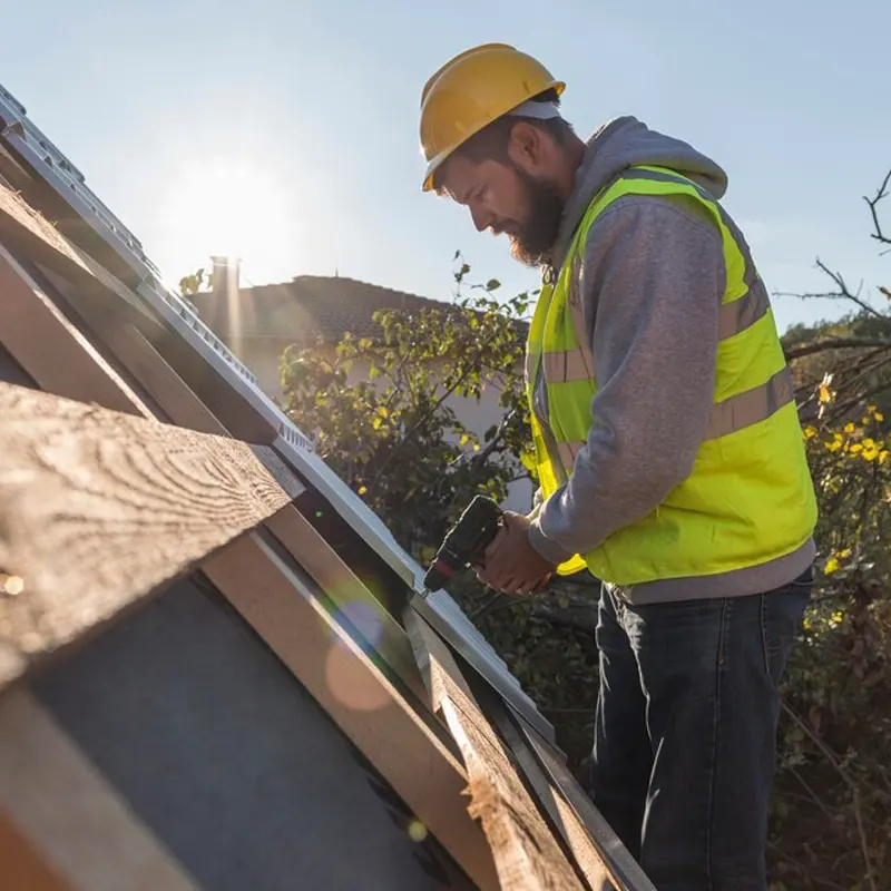 Expert roofing engineer doing roof installation in a Jersey Home.