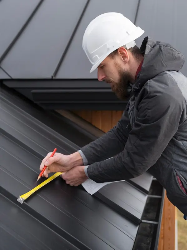 Expert roofing engineer fixing a residential home in Jersey.